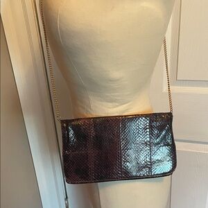 Vintage genuine snakeskin bag with gold strap in a beautiful burgundy color